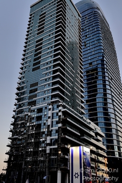 Urban landscapes in Ramat Gan showing visible signs of missile impact, a quiet documentation of structural damage and everyday resilience in times of conflict. Photographed by Amir Darzi. Photography by amir2000.nl, a Dutch photographer.