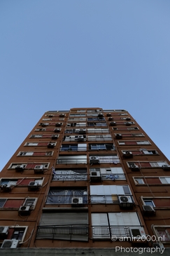 Urban landscapes in Ramat Gan showing visible signs of missile impact, a quiet documentation of structural damage and everyday resilience in times of conflict. Photographed by Amir Darzi. Photography by amir2000.nl, a Dutch photographer.
