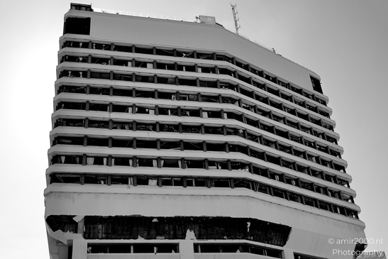 Urban scenes in Tel Aviv bearing the marks of recent missile strikes, a quiet record of damage and the resilience of communities amid conflict in blog, photographed by Amir Darzi. Photography by amir2000.nl, a Dutch photographer.