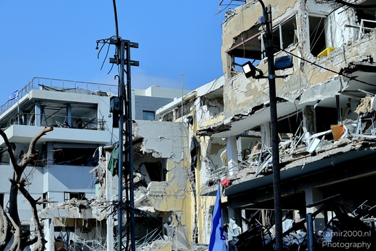 Urban scenes in Tel Aviv bearing the marks of recent missile strikes, a quiet record of damage and the resilience of communities amid conflict in blog, photographed by Amir Darzi. Photography by amir2000.nl, a Dutch photographer.