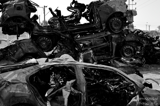 Fragments of lives and stories—the Car Wall Memorial serves as a stark reminder of the events of October 7 and the lives forever changed. Photographed by Amir Darzi. Photography by amir2000.nl, a Dutch photographer.