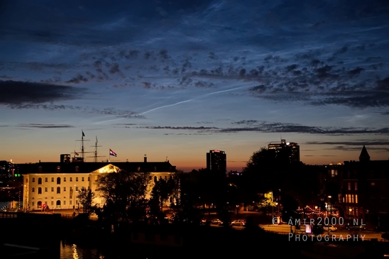 Lichtende_nachtwolken_Sunset_over_Amsterdam_centrum_oostelijke_eilanden_city_photography_01.JPG